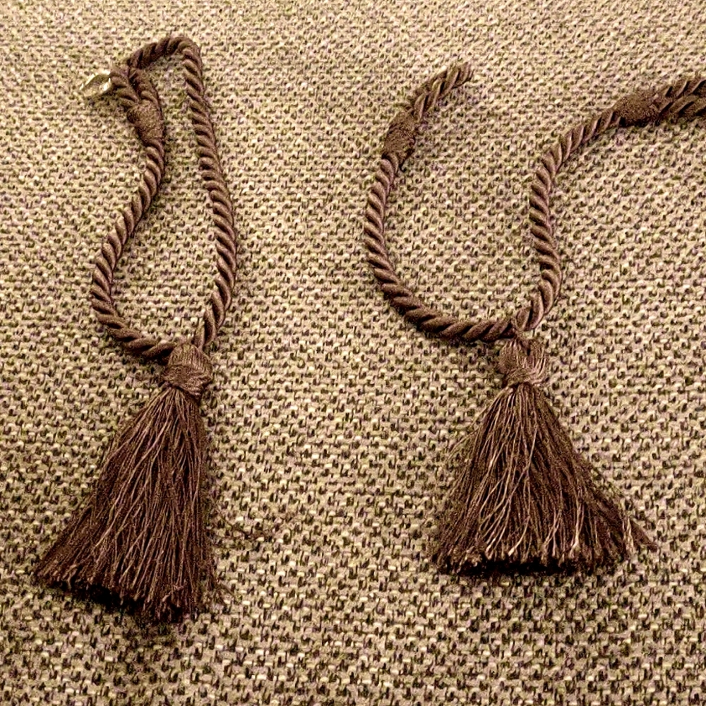 Brown curtain tiebacks